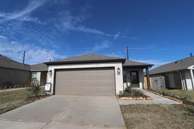 ranch-style house with a front lawn and a garage