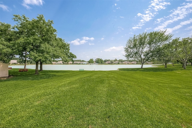 view of yard with a water view