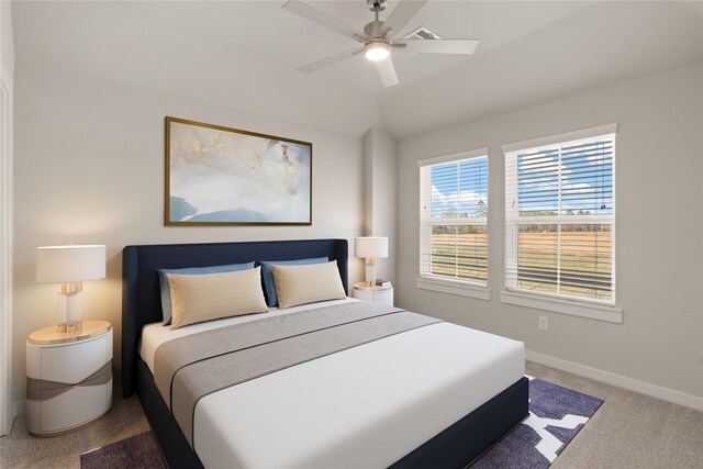 carpeted bedroom featuring lofted ceiling and ceiling fan