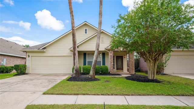 view of front of home featuring a front yard and a garage