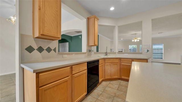 kitchen with dishwasher, sink, kitchen peninsula, ceiling fan, and tasteful backsplash