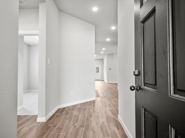 entrance foyer with light hardwood / wood-style floors