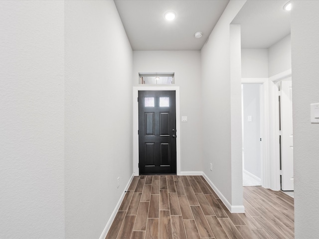 foyer entrance featuring hardwood / wood-style floors