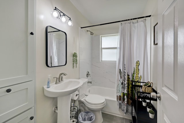 bathroom with toilet and shower / tub combo with curtain