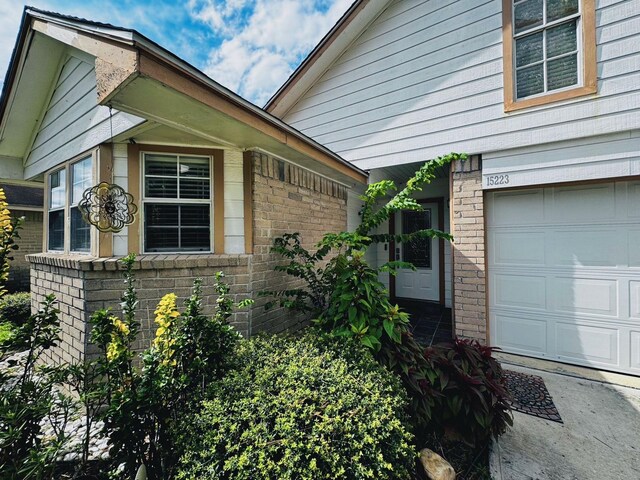 view of side of property with a garage