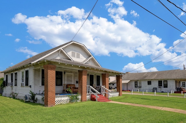 exterior space featuring a front yard and a porch