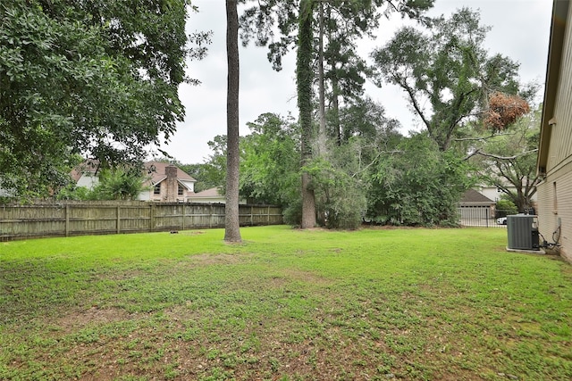 view of yard featuring central AC