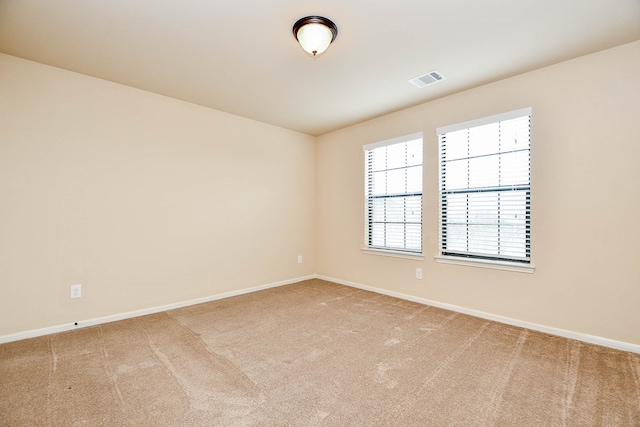 empty room with light carpet