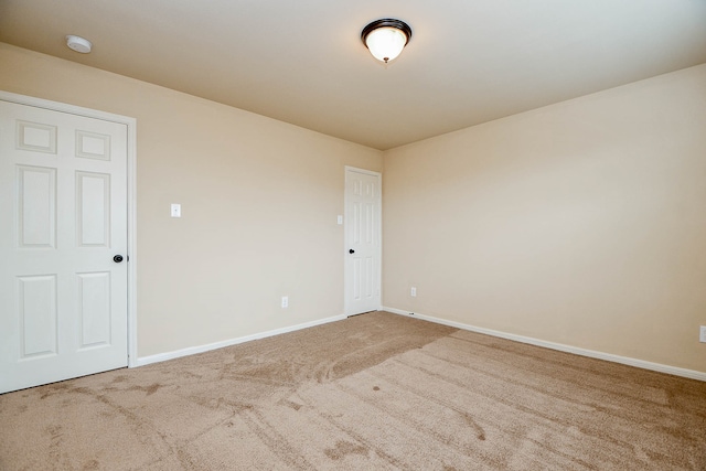 spare room with carpet