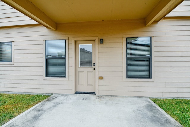 doorway to property featuring a patio