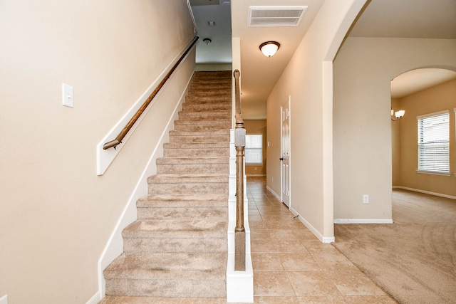 stairway with carpet floors