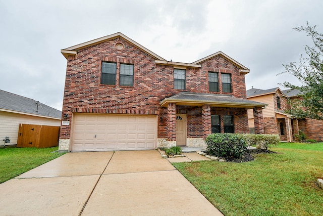 front of property with a front lawn and a garage