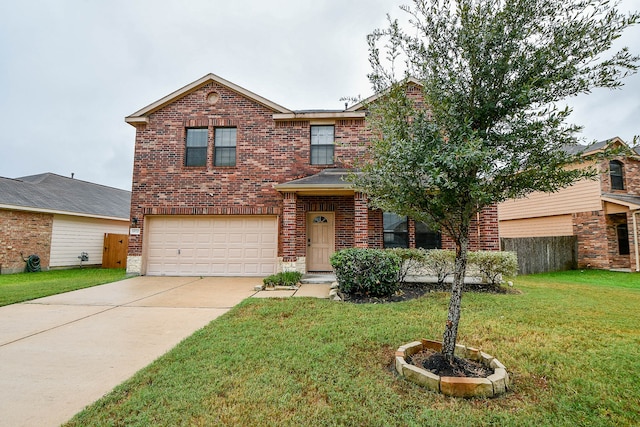 view of front property featuring a front yard and a garage