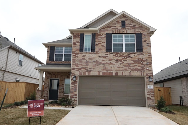 view of front of property with a garage