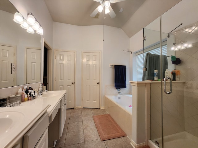 bathroom with plus walk in shower, tile patterned floors, vanity, ceiling fan, and vaulted ceiling