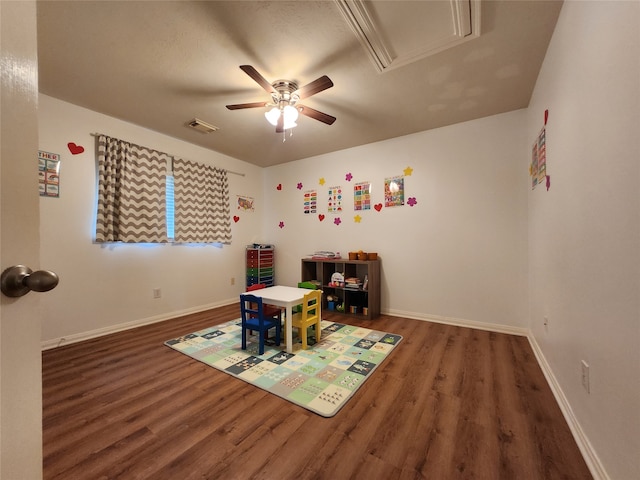 playroom featuring ceiling fan and hardwood / wood-style flooring