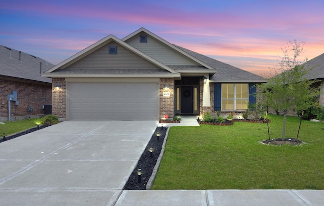 craftsman inspired home with a lawn, central AC, and a garage