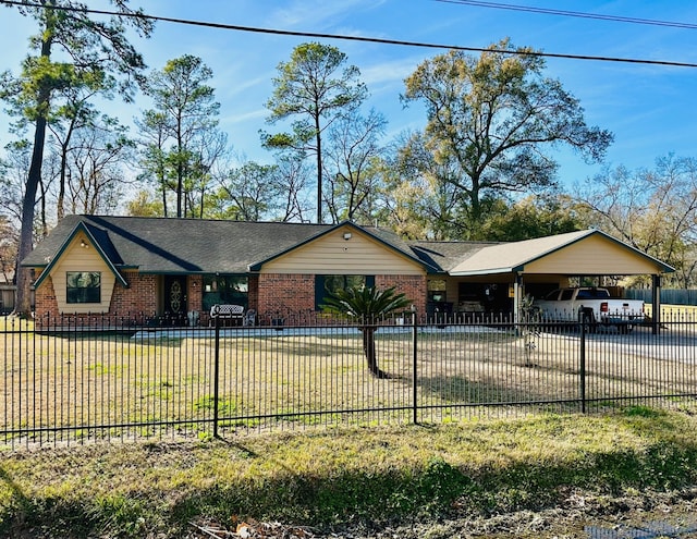 ranch-style home with a front yard