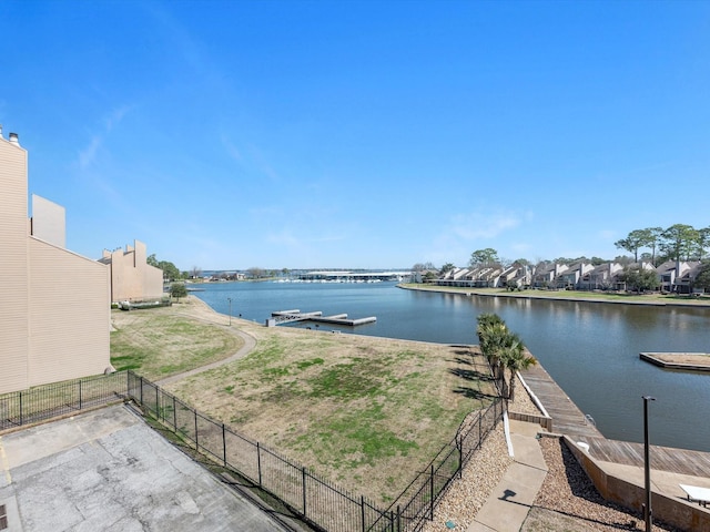 water view featuring fence