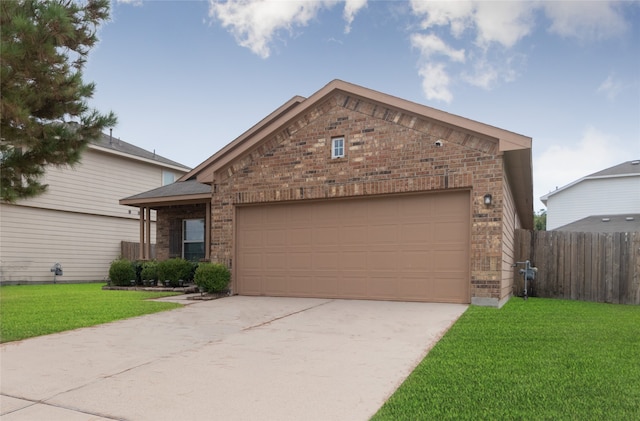 view of front facade featuring a garage and a front lawn