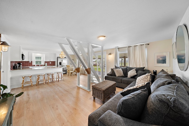 417 Olive St, Surfside Beach, TX 77541 - living room featuring light wood-style floors
