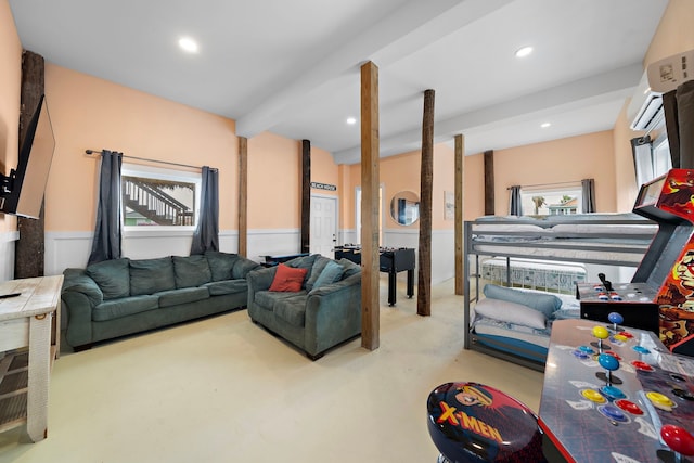 417 Olive St, Surfside Beach, TX 77541 - living area with carpet flooring, beam ceiling, wainscoting, and recessed lighting