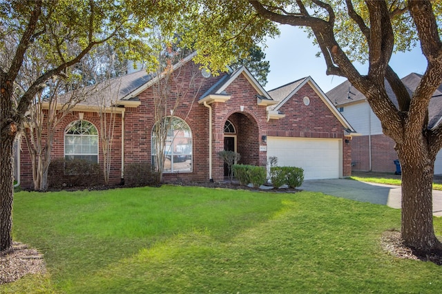 view of front facade with a garage and a front yard