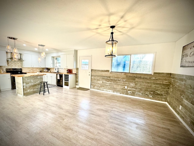 unfurnished living room with light wood-type flooring