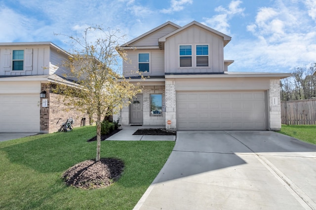 view of front of house featuring a garage and a front lawn