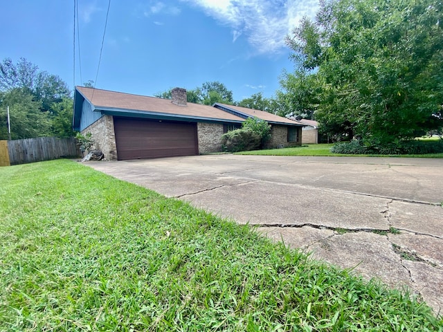 garage with a yard