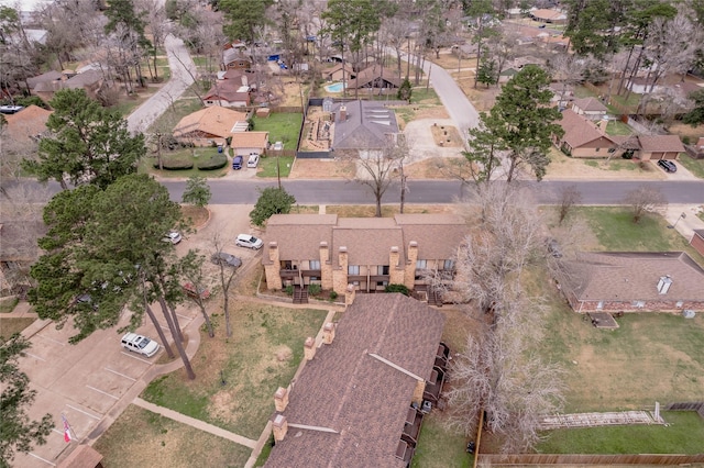 birds eye view of property with a residential view