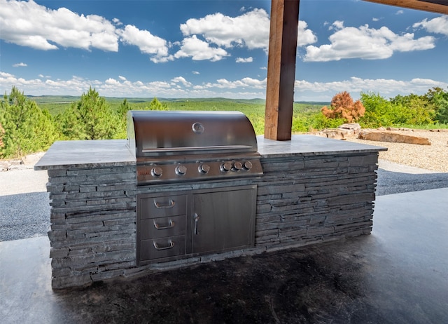 view of patio with exterior kitchen and area for grilling