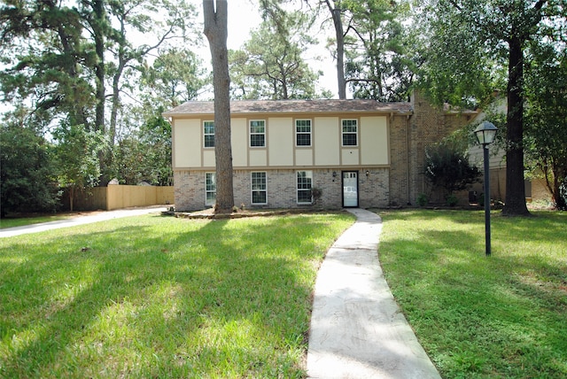 view of front facade featuring a front yard