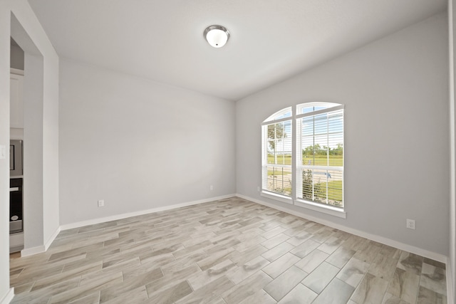 unfurnished room featuring light wood-type flooring