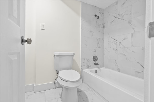 bathroom with toilet and tiled shower / bath combo