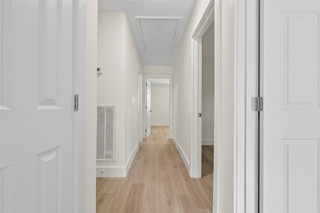 hall featuring light hardwood / wood-style flooring