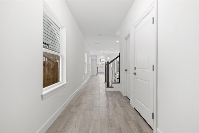 hallway featuring light wood-type flooring