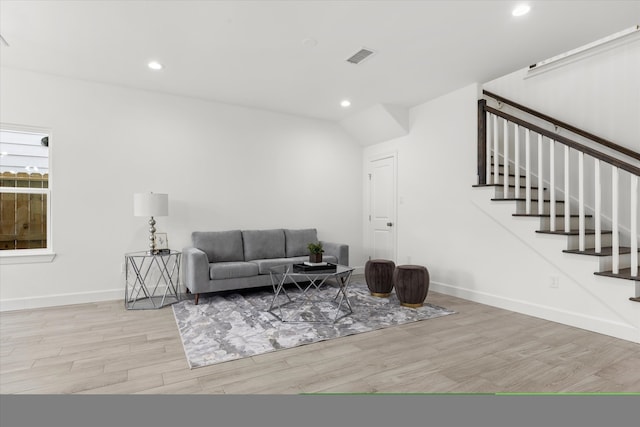 living room with light hardwood / wood-style floors