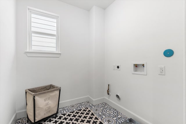 laundry room featuring hookup for an electric dryer, washer hookup, tile patterned floors, and gas dryer hookup