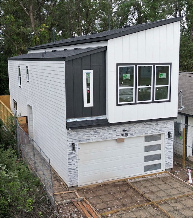 view of property exterior featuring a garage