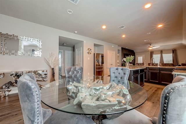 dining area featuring hardwood / wood-style flooring