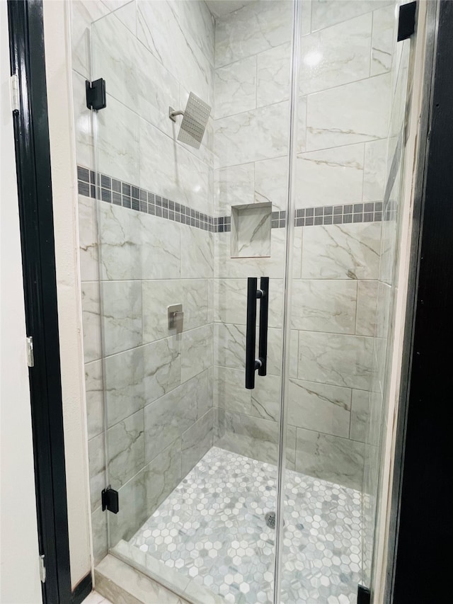 bathroom with walk in shower