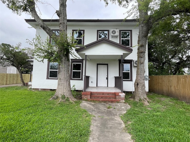 view of front of home with a front yard