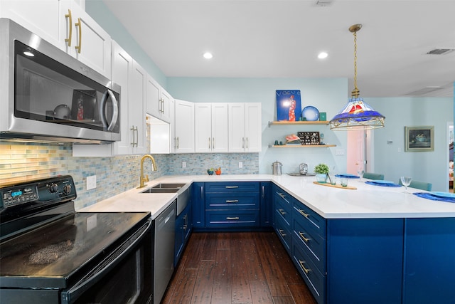 kitchen featuring white cabinetry, sink, dark wood-type flooring, blue cabinets, and appliances with stainless steel finishes