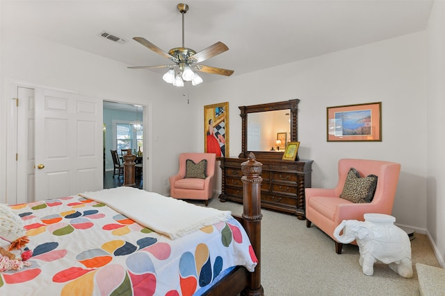 bedroom with ceiling fan and light colored carpet