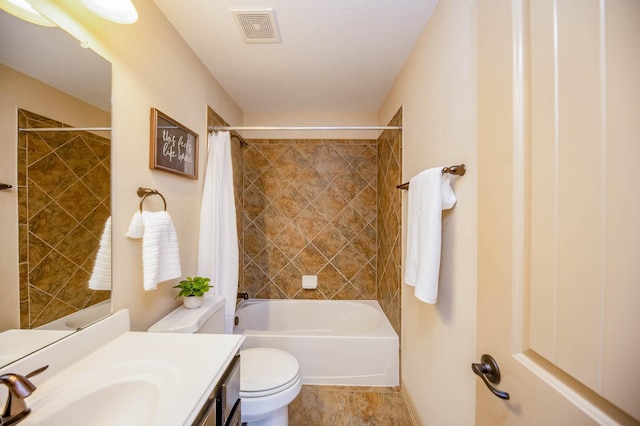 bathroom with shower / tub combo, visible vents, vanity, and toilet