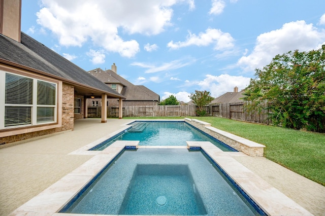 view of swimming pool with a lawn, a patio area, a fenced backyard, and a pool with connected hot tub