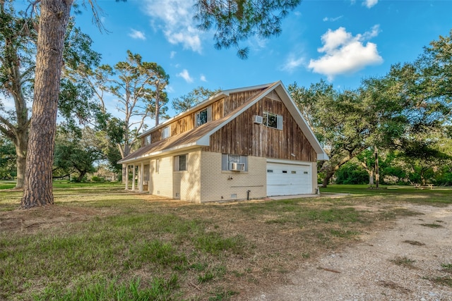 view of property exterior featuring a yard and a garage