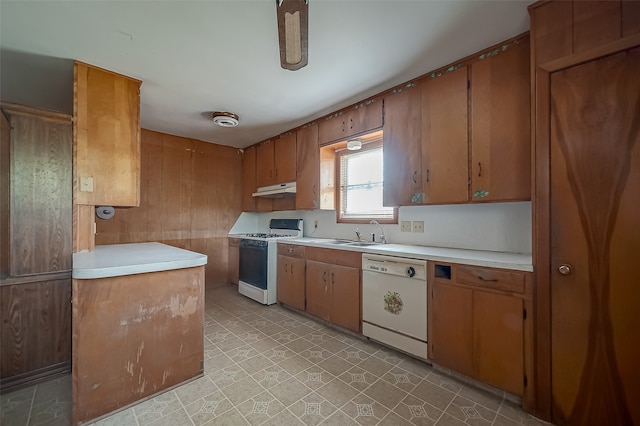 kitchen with sink and white appliances