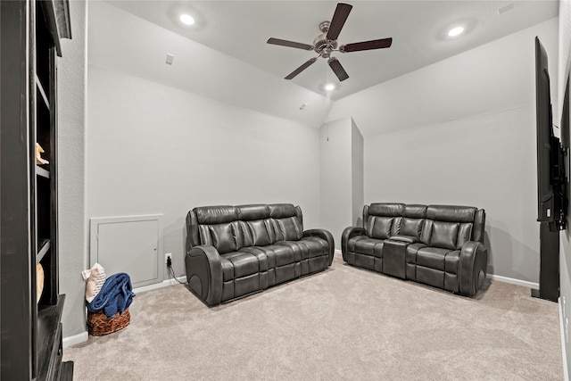 carpeted living room featuring ceiling fan and lofted ceiling